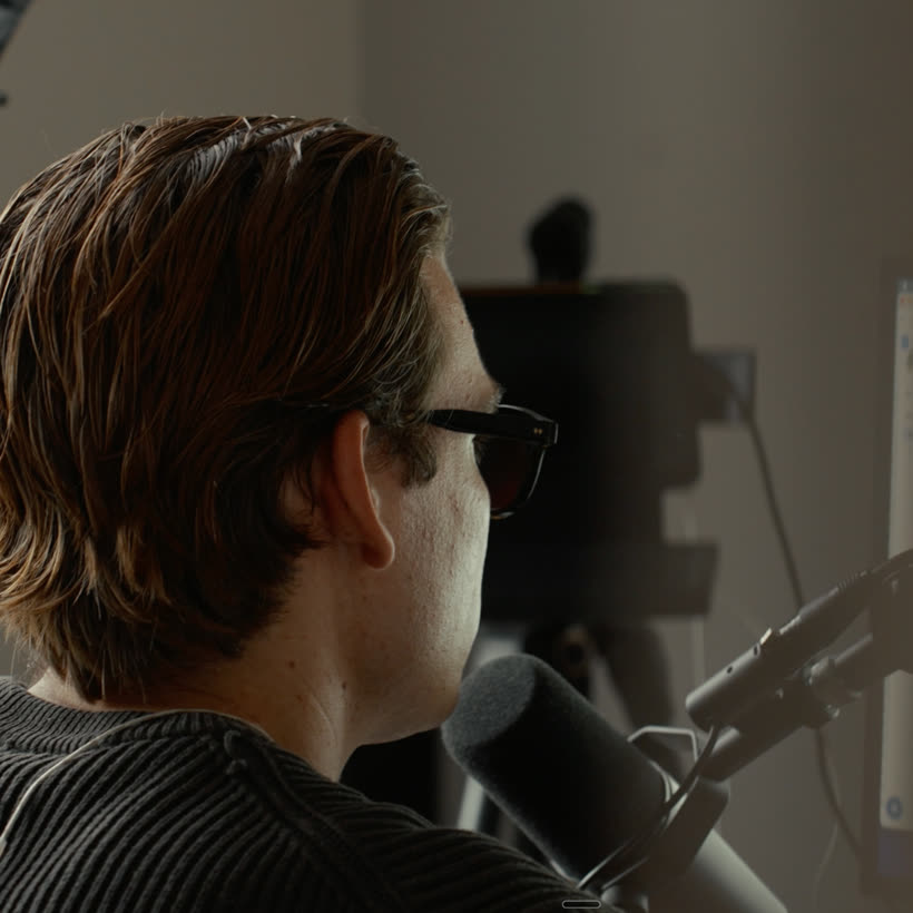 Dylan recording a podcast